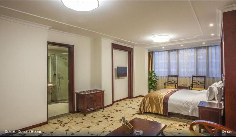 Imagen de la habitación del Hotel HUAJIANG HOTEL. Foto 8