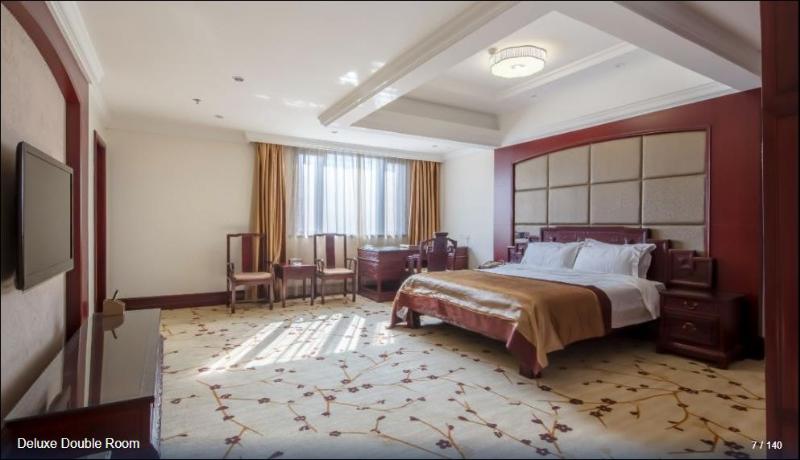 Imagen de la habitación del Hotel HUAJIANG HOTEL. Foto 9