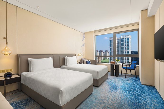 Imagen de la habitación del Hotel HUALUXE Shanghai Changfeng Park, an IHG. Foto 7