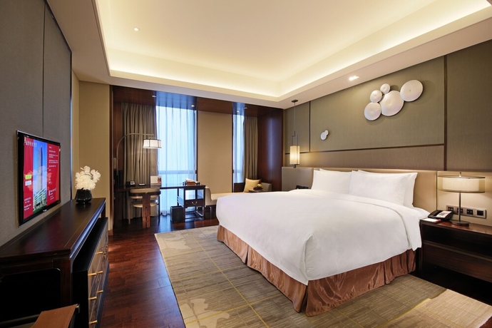 Imagen de la habitación del Hotel HUALUXE Wuxi Taihu. Foto 6