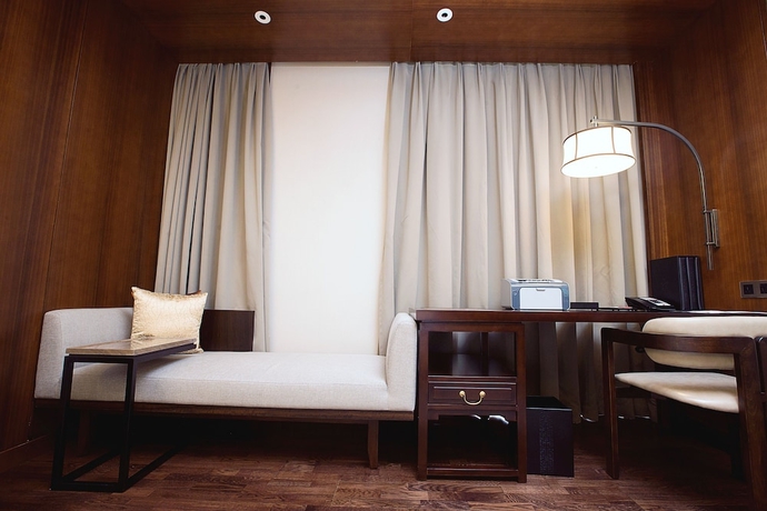 Imagen de la habitación del Hotel HUALUXE Wuxi Taihu. Foto 9