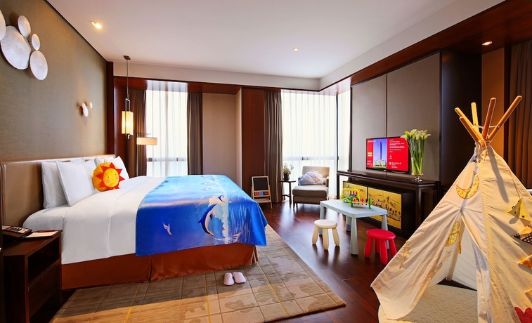 Imagen de la habitación del Hotel HUALUXE Wuxi Taihu. Foto 17