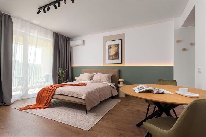 Imagen de la habitación del Hotel HUBIX - City of Mara Apartments. Foto 4