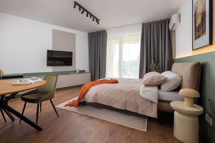 Imagen de la habitación del Hotel HUBIX - City of Mara Apartments. Foto 5