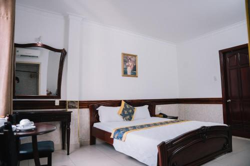 Imagen de la habitación del Hotel HUNG HUONG. Foto 14