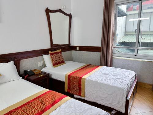 Imagen de la habitación del Hotel HUNG HUONG. Foto 16