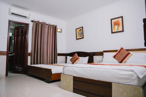 Imagen de la habitación del Hotel HUNG HUONG. Foto 17