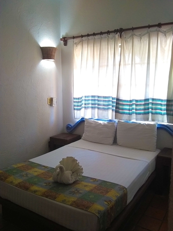 Imagen de la habitación del Hotel HUX Express - Huatulco. Foto 8