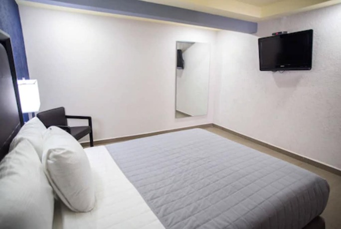 Imagen de la habitación del Hotel Ha. Foto 5