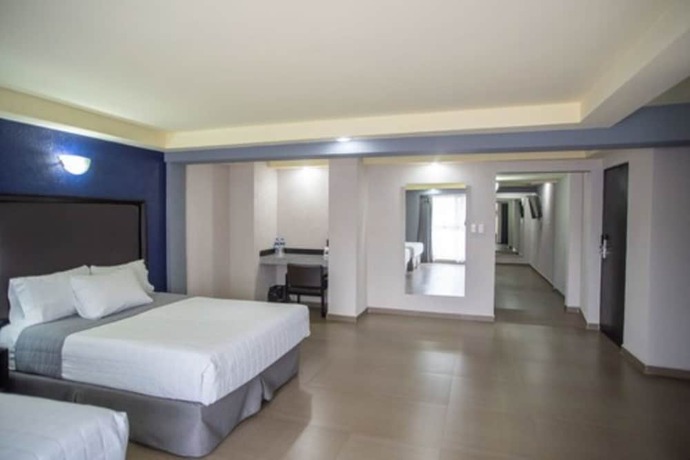 Imagen de la habitación del Hotel Ha. Foto 8