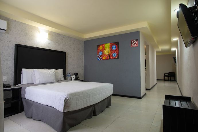 Imagen de la habitación del Hotel Ha. Foto 11