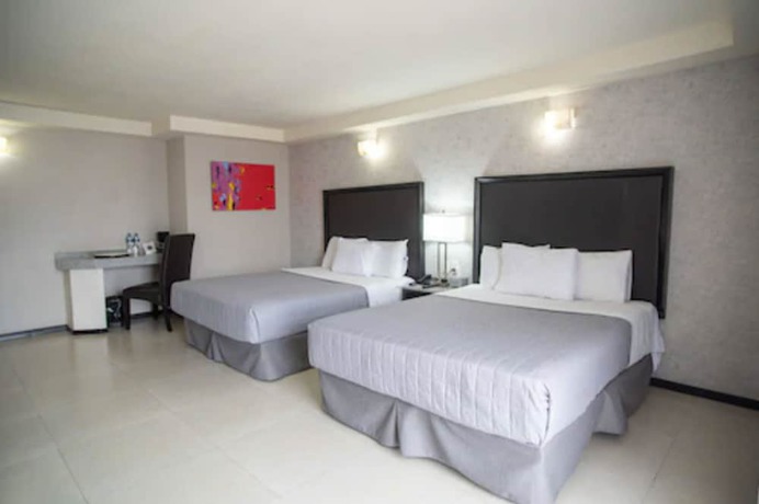 Imagen de la habitación del Hotel Ha. Foto 14