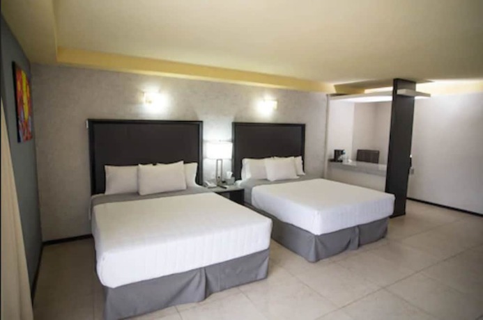 Imagen de la habitación del Hotel Ha. Foto 15
