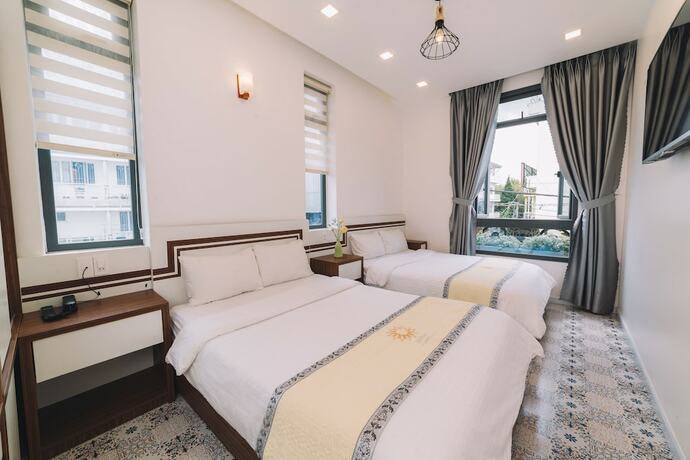 Imagen de la habitación del Hotel Ha Na Da Lat. Foto 11
