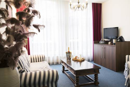 Imagen de la habitación del Hotel Haarlem Hotelsuites. Foto 3