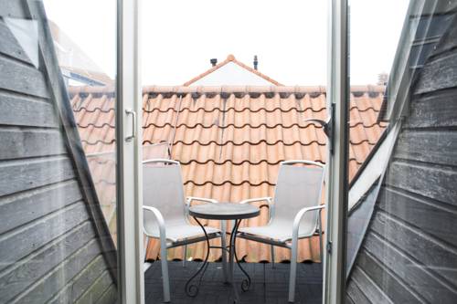 Imagen de la habitación del Hotel Haarlem Hotelsuites. Foto 7