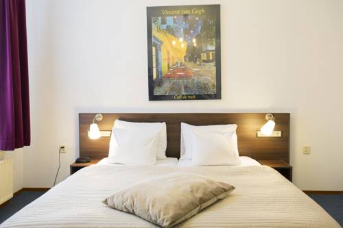 Imagen de la habitación del Hotel Haarlem Hotelsuites. Foto 8