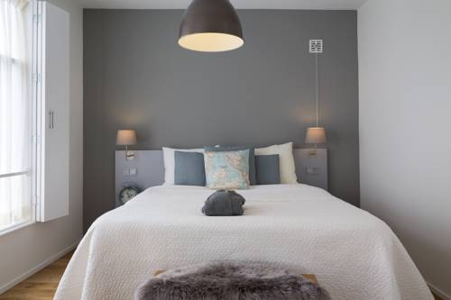 Imagen de la habitación del Hotel Haarlem Hotelsuites. Foto 9