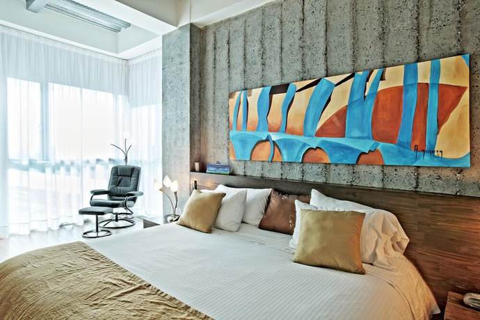 Imagen de la habitación del Hotel Habitat Suites. Foto 2