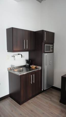 Imagen de la habitación del Hotel Habitat Suites. Foto 3