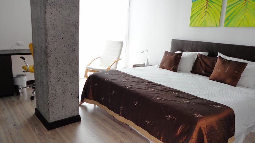 Imagen de la habitación del Hotel Habitat Suites. Foto 4