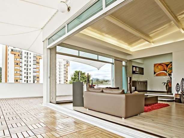 Imagen de la habitación del Hotel Habitat Suites. Foto 16