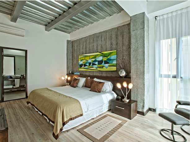 Imagen de la habitación del Hotel Habitat Suites. Foto 18