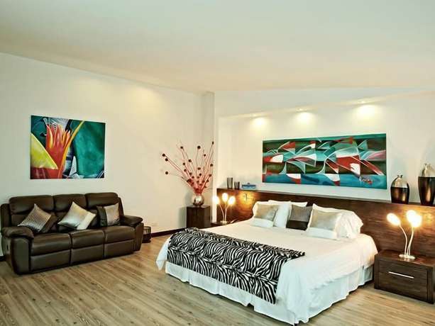 Imagen de la habitación del Hotel Habitat Suites. Foto 19