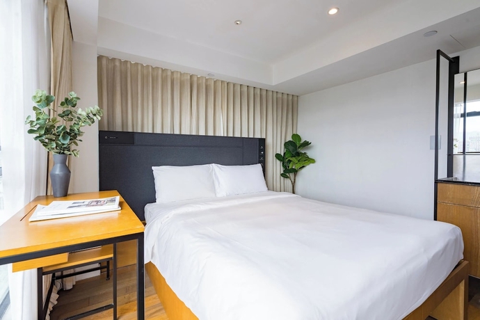 Imagen de la habitación del Hotel Habyt Austin Avenue. Foto 9