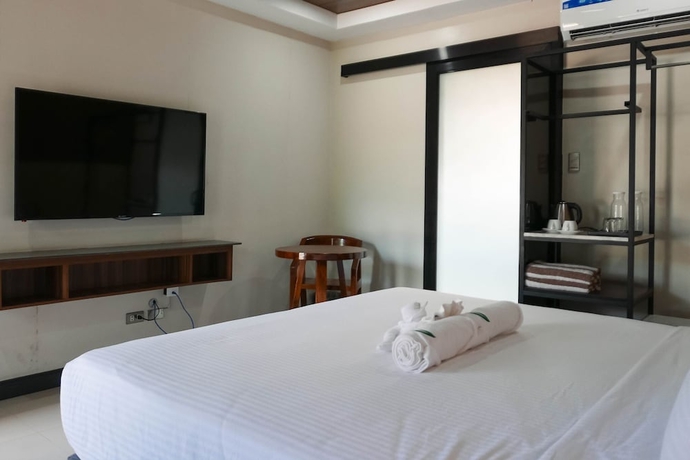 Imagen de la habitación del Hotel Hacienda Angelita Nature Farm and Resort. Foto 13