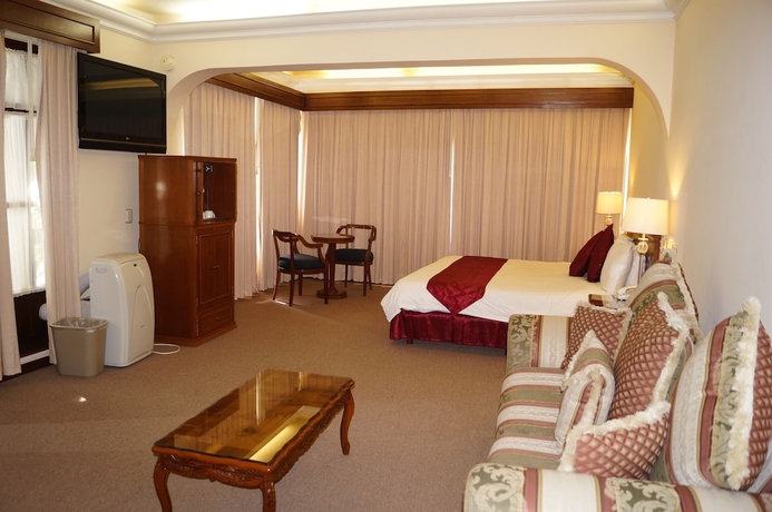 Imagen de la habitación del Hotel Hacienda De Los &Aacute;ngeles By Rotamundos. Foto 13