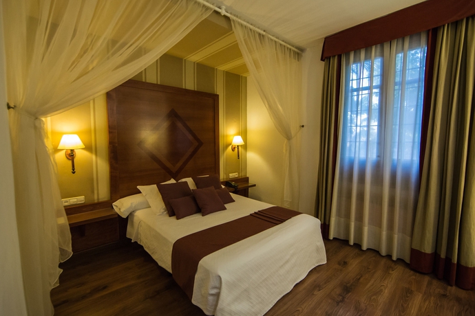 Imagen de la habitación del Hotel Hacienda Del Cardenal. Foto 3