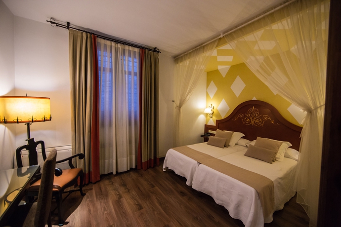 Imagen de la habitación del Hotel Hacienda Del Cardenal. Foto 4