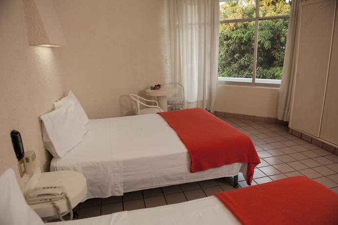 Imagen de la habitación del Hotel Hacienda Del Rio. Foto 7