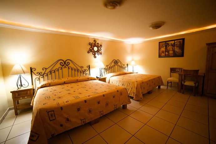 Imagen de la habitación del Hotel Hacienda Del Sol. Foto 5