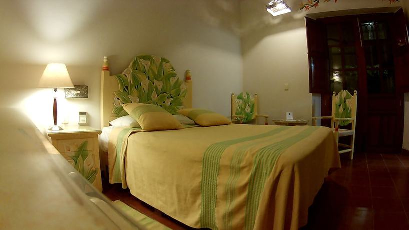 Imagen de la habitación del Hotel Hacienda Don Cenobio. Foto 14