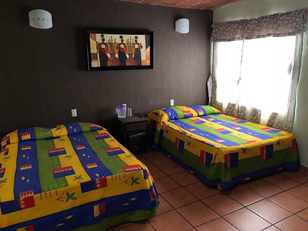 Imagen de la habitación del Hotel Hacienda El Ceboruco. Foto 14