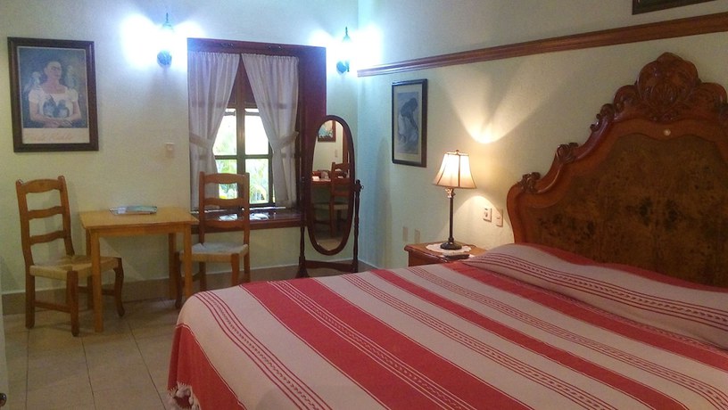 Imagen de la habitación del Hotel Hacienda Flamingos. Foto 8