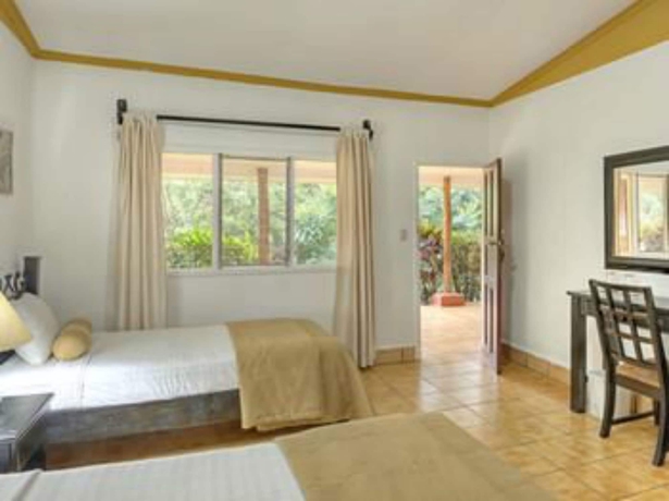 Imagen de la habitación del Hotel Hacienda Guachipelin. Foto 8