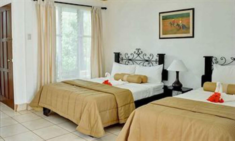 Imagen de la habitación del Hotel Hacienda Guachipelin. Foto 14