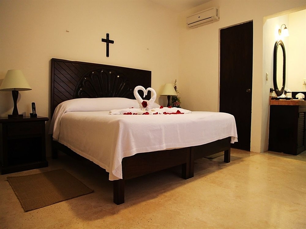 Imagen de la habitación del Hotel Hacienda Kaan Ac. Foto 4