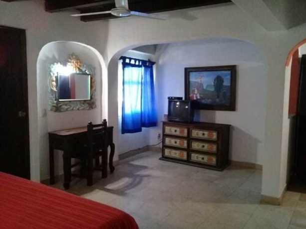 Imagen de la habitación del Hotel Hacienda La Puerta De Enmedio. Foto 9