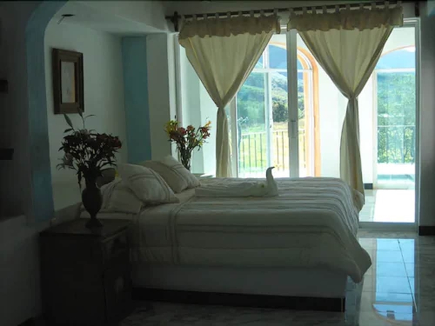 Imagen de la habitación del Hotel Hacienda La Puerta De Enmedio. Foto 12