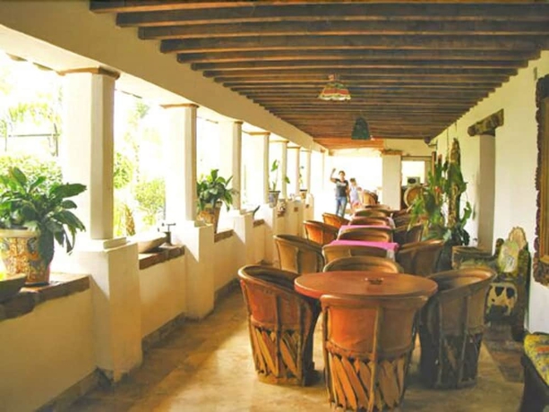 Imagen del bar/restaurante del Hotel Hacienda La Puerta De Enmedio. Foto 4
