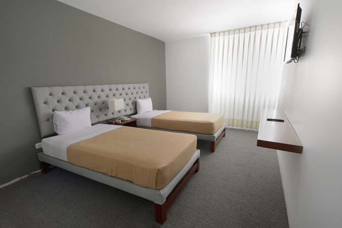 Imagen de la habitación del Hotel Hacienda Lima Norte. Foto 5