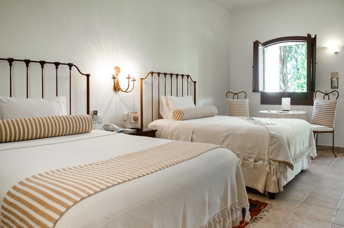 Imagen de la habitación del Hotel Hacienda Los Laureles - Spa. Foto 4