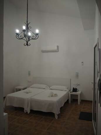 Imagen de la habitación del Hotel Hacienda Marcharavi. Foto 16