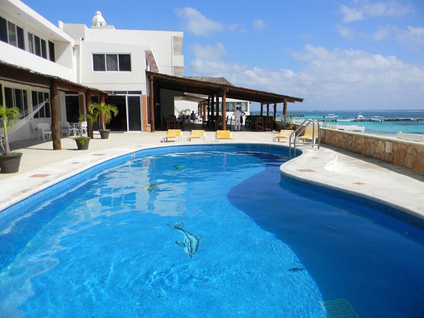 Imagen de los exteriores del Hotel Hacienda Morelos Beach Front. Foto 8