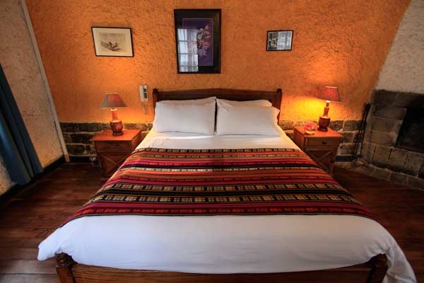 Imagen de la habitación del Hotel Hacienda Pinsaqui. Foto 4