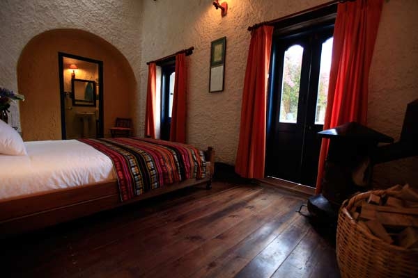 Imagen de la habitación del Hotel Hacienda Pinsaqui. Foto 5